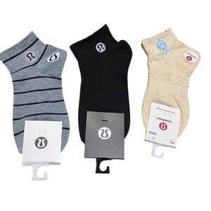 THREE (3) PAIRS OF LULULEMON CREW SOCKS